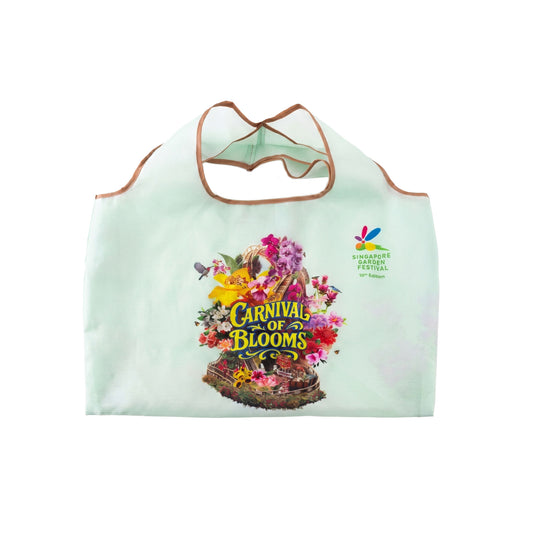 Mint tote shopper bag with brown handles and colorful Carnival of Blooms graphic